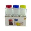 Set of three small glass canisters